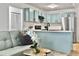 Stylish kitchen with stainless steel appliances and counter, open to the living area at 2196 Spoleto Ln, North Charleston, SC 29406