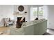 Cozy living room featuring a fireplace, comfortable seating, and abundant natural light at 2196 Spoleto Ln, North Charleston, SC 29406