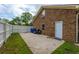 Backyard features a patio area, lawn, and white fence offering privacy at 2233 Glendale Dr, Charleston, SC 29414