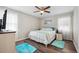 Relaxing bedroom featuring natural light, ceiling fan, and calm color palette at 2233 Glendale Dr, Charleston, SC 29414