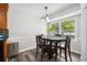 Cozy dining area featuring dark wood table and chair set at 2233 Glendale Dr, Charleston, SC 29414