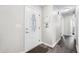 Bright entryway with a decorative door and hardwood floors at 2233 Glendale Dr, Charleston, SC 29414