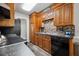 This well-organized kitchen features wood cabinets, stainless steel appliances, and plenty of counter space at 2233 Glendale Dr, Charleston, SC 29414