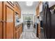 Spacious kitchen with wood cabinets and stainless steel appliances flows seamlessly into the dining area at 2233 Glendale Dr, Charleston, SC 29414