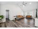 Bright, open living room with vaulted ceiling and hardwood floors at 2233 Glendale Dr, Charleston, SC 29414