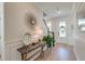 Elegant entryway featuring a console table with decorative accents and hardwood floors at 2237 Tillage St, Mount Pleasant, SC 29466