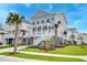Charming coastal home with a raised foundation, lush lawn, and beautiful landscaping at 2237 Tillage St, Mount Pleasant, SC 29466