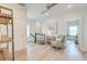 Bright hallway with hardwood floors, stylish seating and decor at 2237 Tillage St, Mount Pleasant, SC 29466