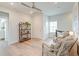 Bright hallway with hardwood floors, stylish seating and decor at 2237 Tillage St, Mount Pleasant, SC 29466