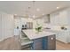 Spacious kitchen featuring an island with seating, modern appliances, and white cabinetry at 2237 Tillage St, Mount Pleasant, SC 29466