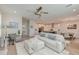 Spacious living area with stylish sofa, modern decor, open layout and natural light at 2237 Tillage St, Mount Pleasant, SC 29466