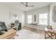 Bright home office with two windows, light wood floors, and modern furnishings at 2237 Tillage St, Mount Pleasant, SC 29466