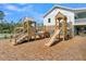Community playground with a wooden playset and soft mulch, great for  at 2237 Tillage St, Mount Pleasant, SC 29466