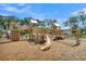 Well-equipped wooden playground with slides, climbing structures, and a soft surface for safe and enjoyable playtime at 2237 Tillage St, Mount Pleasant, SC 29466