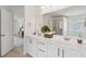Bright, modern bathroom with double sinks, granite countertops, and updated fixtures at 2254 Show Basket Way, Mount Pleasant, SC 29466