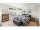 Serene bedroom with natural light, stylish furnishings, and neutral decor at 2632 Private Lefler Dr, Johns Island, SC 29455