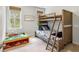 bedroom featuring bunk beds and a toy table with lots of light from windows at 2632 Private Lefler Dr, Johns Island, SC 29455