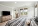 Comfortable bedroom with dressers, relaxing decor, and plenty of natural light at 2632 Private Lefler Dr, Johns Island, SC 29455