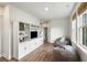 Bonus room with hardwood floors, built in shelving and cabinet, and two beanbag chairs at 2632 Private Lefler Dr, Johns Island, SC 29455