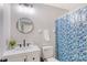 Clean bathroom featuring a round mirror, new faucet fixtures and a shower at 2777 Forest Dew Ct, Charleston, SC 29414