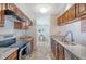 Bright kitchen featuring updated appliances, ample counter space, tile floors and lots of storage at 2777 Forest Dew Ct, Charleston, SC 29414