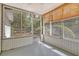 Relaxing porch with screens and window coverings offering a peaceful retreat with outdoor views at 2777 Forest Dew Ct, Charleston, SC 29414