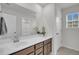 Bathroom featuring a vanity with sink and view of shower and closet at 280 Swamp Creek Ln, Moncks Corner, SC 29461