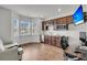 Bright bonus room features a kitchenette and a large bay window at 280 Swamp Creek Ln, Moncks Corner, SC 29461
