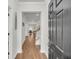 Inviting entryway with hardwood floors and a view of the dining area and stairs at 280 Swamp Creek Ln, Moncks Corner, SC 29461