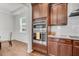 Updated kitchen featuring stainless steel built-in microwave and oven with wood cabinets and granite countertops at 280 Swamp Creek Ln, Moncks Corner, SC 29461