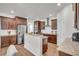 Modern kitchen featuring stainless steel appliances, granite countertops, and wood cabinets at 280 Swamp Creek Ln, Moncks Corner, SC 29461
