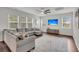 Spacious living room with modern furniture, hardwood floors, and plenty of natural light at 280 Swamp Creek Ln, Moncks Corner, SC 29461