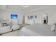 Bright main bedroom with TV, dresser, closet, and chair with ottoman at 280 Swamp Creek Ln, Moncks Corner, SC 29461