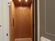 Spacious home elevator featuring wood paneling, recessed lighting, and a sleek control panel for modern convenience at 295 W Coleman Blvd, Mount Pleasant, SC 29464