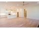 Spacious open-concept kitchen with a large island, white cabinets, hardwood floors and plenty of natural light at 295 W Coleman Blvd, Mount Pleasant, SC 29464