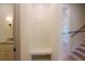Stylish mudroom with bench seating, coat hooks, and elegant wall paneling, seamlessly blending function and design at 295 W Coleman Blvd, Mount Pleasant, SC 29464