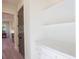 Bright mudroom features white cabinets, marble countertops, and convenient storage shelves; a blend of style and function at 295 W Coleman Blvd, Mount Pleasant, SC 29464