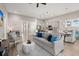 Spacious open-concept living room showcasing modern furnishings, natural light, and stylish decor at 3005 Aura Ln, Summerville, SC 29483