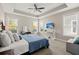 Serene main bedroom with tray ceiling, plush carpeting, and ample natural light creating a peaceful retreat at 3005 Aura Ln, Summerville, SC 29483