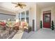 Inviting front porch featuring comfortable seating and a warm, welcoming atmosphere at 3005 Aura Ln, Summerville, SC 29483