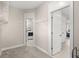 Spacious walk-in closet with shelving and access to laundry area at 3005 Aura Ln, Summerville, SC 29483
