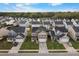 An aerial view showcasing community featuring mature trees, lush lawns, and nearby lake at 320 Silverleaf Ln, Moncks Corner, SC 29461