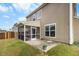 A home with a backyard and a screened in porch at 320 Silverleaf Ln, Moncks Corner, SC 29461
