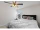 Bright bedroom with ceiling fan, plush carpeting, and window; a simple, cozy design at 320 Silverleaf Ln, Moncks Corner, SC 29461