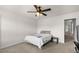 Cozy bedroom featuring neutral walls, carpet, ceiling fan, and small side table that offer a calm space for relaxation and rest at 320 Silverleaf Ln, Moncks Corner, SC 29461