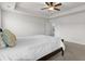 Bright bedroom with tray ceiling, carpet, and ceiling fan; a simple, inviting space at 320 Silverleaf Ln, Moncks Corner, SC 29461