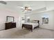 Spacious bedroom with neutral carpet, a ceiling fan, and ample natural light at 320 Silverleaf Ln, Moncks Corner, SC 29461