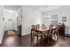 Formal dining room with hardwood floors, wainscoting, and elegant chandelier at 320 Silverleaf Ln, Moncks Corner, SC 29461