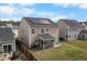 Back of home featuring solar panels and a screened in porch at 320 Silverleaf Ln, Moncks Corner, SC 29461