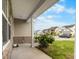 Inviting front porch with brick accents and a view of the neighborhood street at 320 Silverleaf Ln, Moncks Corner, SC 29461